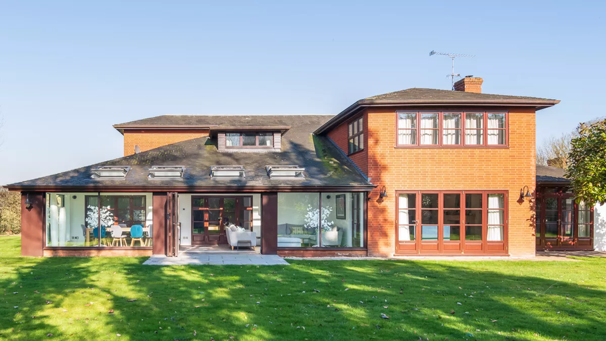 Rear elevation of a garden room extension seen from the garden