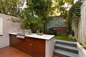 A change in level in a small garden can give the impression of space.