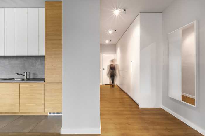 Spotlights will give a long and thin space a better continuity of light level