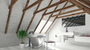 Modern attic room with wooden beams, a bathtub, and minimalist decor.
