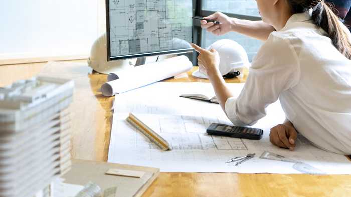 technical drawing on paper and computer technical drawing on paper and computer