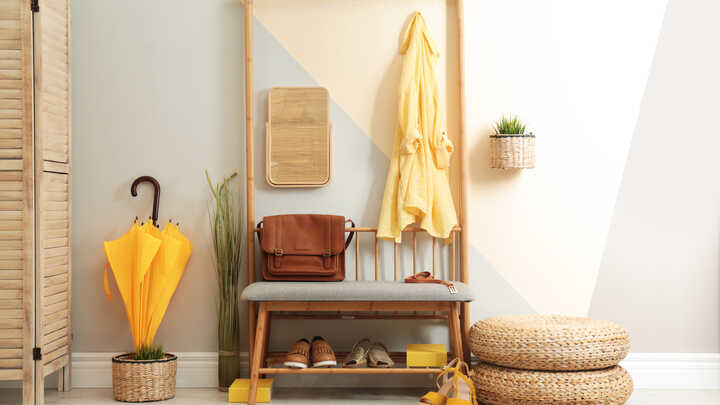 entrance way with yellow umbrella