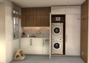 Stacking the washing machine and dryer in a cupboard frees up extra storage space and creates a clean, tidy look.