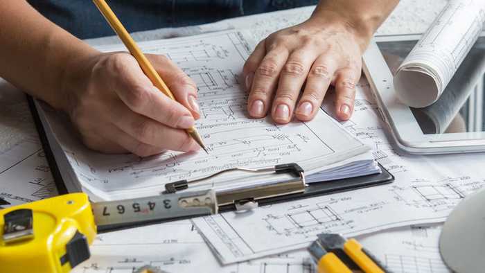 technical drawing on clipboard