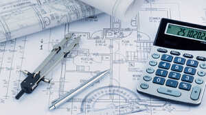Blueprints, a calculator, a compass, a pen, and a protractor on a desk.