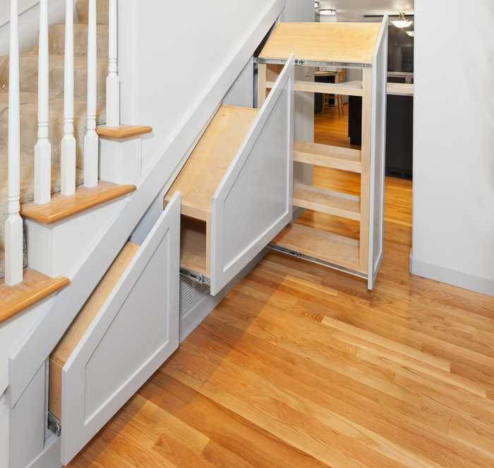 Under stairs storage is a great way to minimise clutter in the Hallway